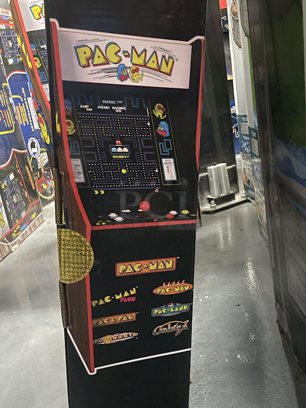 Arcade1UP 40th Anniversary Pac Man At Home Arcade. Games: Pac-Man, Pac-Man Plus, Pac & Pal, Pac-Land, Pacmania, Galaga, Super Pac-Man. Included In The Box: Arcade Cabinet (45.8" H) • 17" LCD Screen • Controller Deck With Preassembled Buttons • Deck Protector • Power Adapter • Instruction Manual - Image 4 of 4