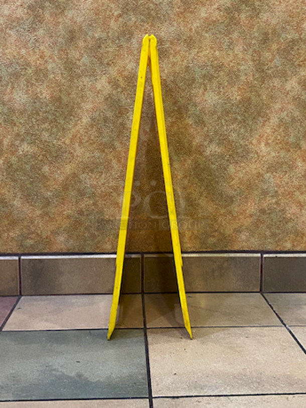 Update International WFS-25 Caution Wet Floor Sign, Yellow, 24".

Fold-out style
Polypropylene construction
Sign is tall and highly visible
Text in both English and Spanish
Alerts patrons where there is a wet floor - Image 3 of 3