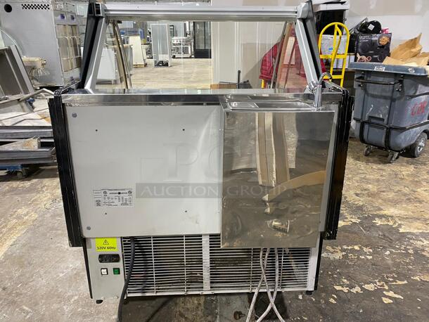 The Hydra-Kool KFM-GL-40-S Gelato/Ice cream Case is a versatile product designed with service type in mind, measuring 40-3/8"W x 43-3/8"D x 48-7/8"H. It has a large capacity of (10) pans ... - Image 5 of 5