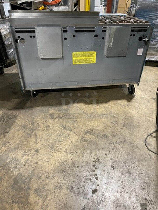 WOW! NEVER USED! Garland Commercial Natural Gas Powered 4 Burner Stove With Right Side Flat Griddle! Griddle Has Back And Side Splashes! With 2 Compartment Storage Space Underneath! All Stainless Steel! On Casters! Model: G604G36SS SN: 1712100102342 - Image 3 of 12