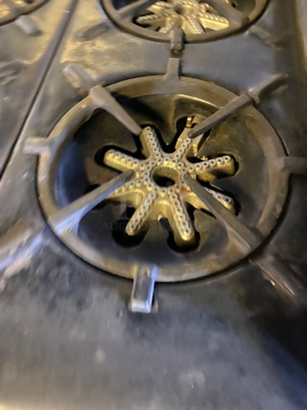 Commercial Natural Gas Powered 4 Burner Stove! With Built In Flat Top Grill! With Back Splash And Salamander Shelf! With Full Size Oven! Metal Oven Rack! With 2 Door Storage Area Underneath! All Stainless Steel! - Image 7 of 12