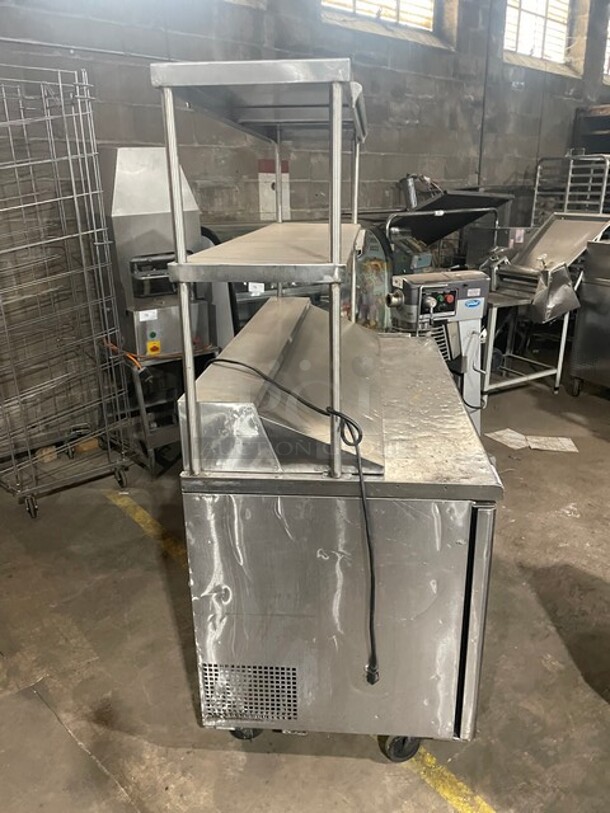 Nice! Turbo Air Stainless Steel Commercial Sandwich/Salad Refrigerated Prep Table! Eletric Powered! On Casters! With Double Over Head Shelf! MODEL TST-60SD 115V
 - Image 4 of 10