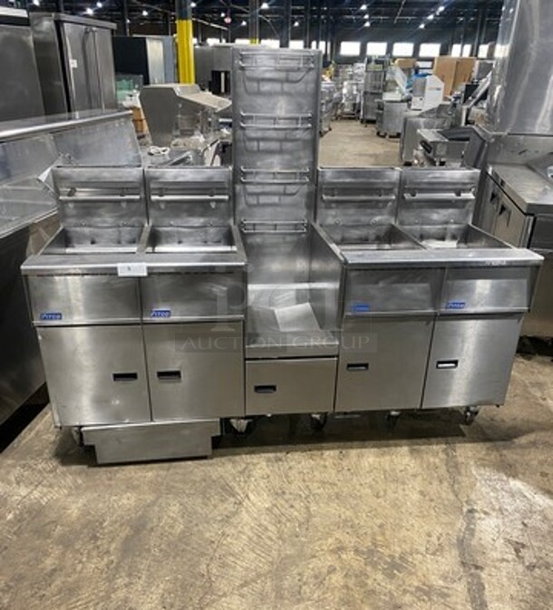 FAB! Pitco Frialator Commercial Natural Gas Powered 4 Bay Deep Fat Fryer! With Middle Fryer Basket Rack! With Oil Filter System! All Stainless Steel! On Casters! WORKING WHEN REMOVED! Model: SGH50 SN: G10HC034159 - Image 1 of 12