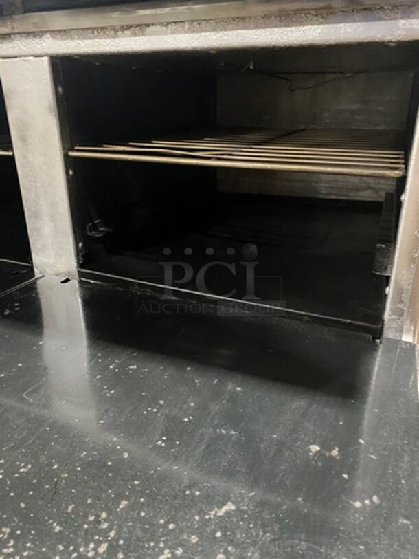 American Range Commercial Natural Gas Powered 8 Burner Stove! With Raised Back Splash And Salamander Shelf! With 2 Oven Underneath! Metal Oven Racks! All Stainless Steel! On Casters! - Image 8 of 10