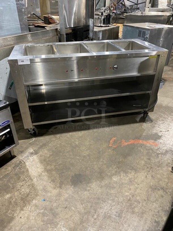 Traulsen Commercial Electric Powered 4 Well Steam Table! With Storage Space Underneath! All Stainless Steel! On Casters! Model: HWEM50MC SN: T233090B02 115V 60HZ 1 Phase