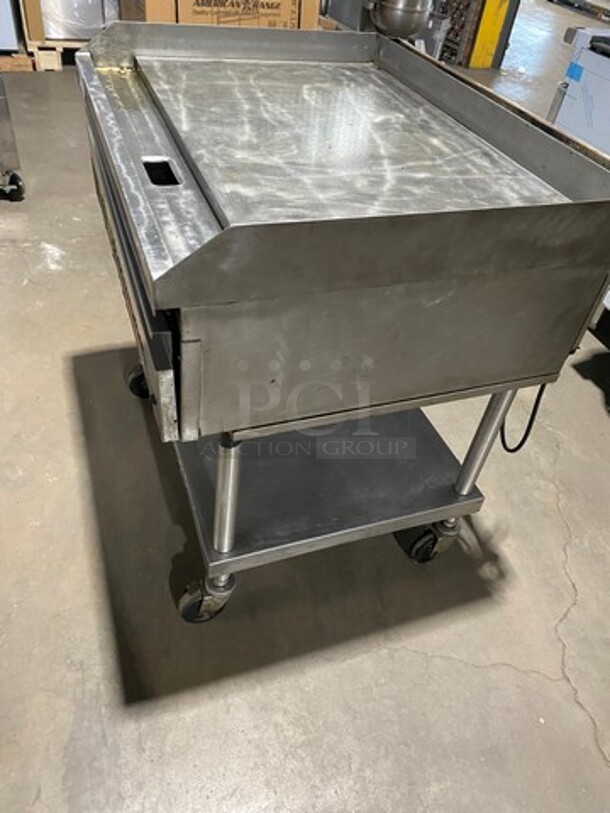 Lang Commercial Countertop Natural Gas Powered Flat Top Griddle! With Back And Side Splashes! On Equipment Stand! With Storage Space Underneath! All Stainless Steel! On Casters! SELECTRONIC SERIES! Model: G3EI SN: E76955 - Image 2 of 11