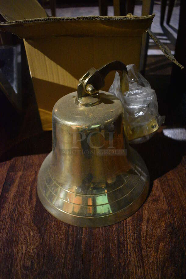 Gold Finish Metal Bell. 9x9x10. (lounge)