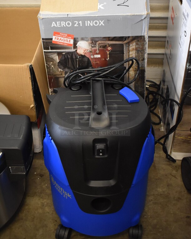 BRAND NEW IN BOX! Nilfisk AERO 21-01 PC US PC Poly Blue and Black Shop Vac Vacuum Cleaner on Casters. 120 Volts, 1 Phase. 14x14x20. Tested and Working! - Image 1 of 8