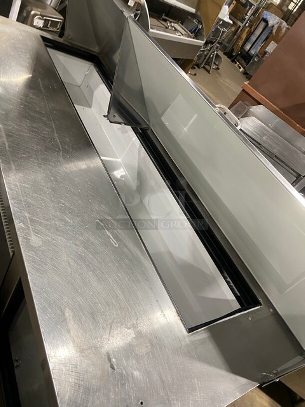 True Commercial Refrigerated Mega Top Sandwich Prep Table! With 3 Door Storage Space Underneath! Poly Coated Racks! All Stainless Steel! On Casters! Model: TSSU7218 SN: 14477571! 115V 60HZ 1 Phase! - Image 7 of 9