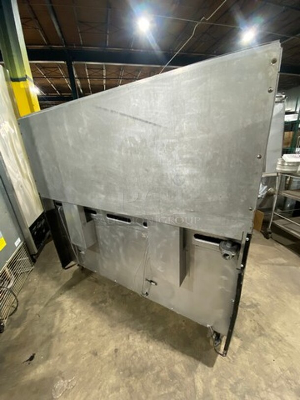 AMAZING FIND! Garland Natural Gas Powered 10 Burner Stove! With 2 Full-Sized Ovens! With Metal Oven Racks! With Raised Back Splash & Salamander Shelf! Stainless Steel! On Casters! - Image 4 of 11