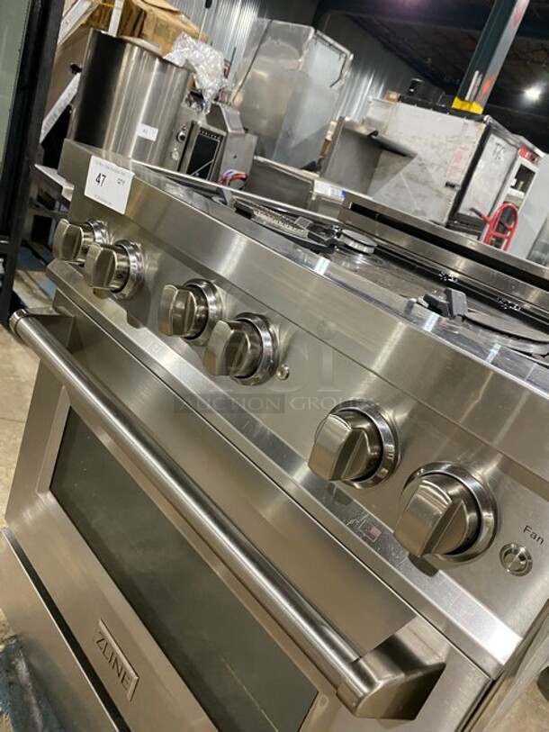 Nice! ZLINE Gas Powered 4 Burner Stove! With Oven Underneath! Stainless Steel! On Legs! MODEL: RG30 SN:20082976013!
 - Image 6 of 9