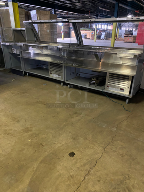AMAZING! Duke Stainless Steel Commercial Subway Prep Line w/ Lowering Sneeze Guards. (1) Hot Well, (2) Refrigerated Prep Tables, (1) Point of Sale Station, 4 In Counter Cup Dispensers, (4) Chip Merchandisers, Credit Card Machine Mount and Rear Lower Dry Storage. Separates Into 4 Pieces! Model: SWD70060FLM SN: 10100312 120V 60HZ 1 Phase, Model: SWH70025FLM SN: 09103602 120V 60HZ 1 Phase, Model: SUBCPTC60M SN: 10100174 120V 60HZ 1 Phase - Image 4 of 12