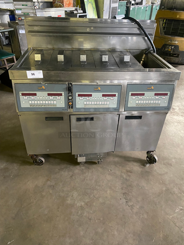 Amazing! Henny Penny Commercial Natural Gas Powered 6 Section/Bay Deep Fat Fryer! With Oil Filter System! With Fryer Covers! All Stainless Steel! On Casters! Model: LVG103SSS SN: BU1108022 120V 60HZ 1 Phase!