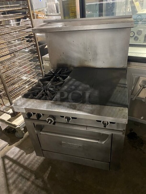 Sweet! Garland Heavy Duty Natural Gas Powered 2 Burner & 24 Inch French Top Combo! With Full Size Oven Underneath! On Legs!  - Image 1 of 9