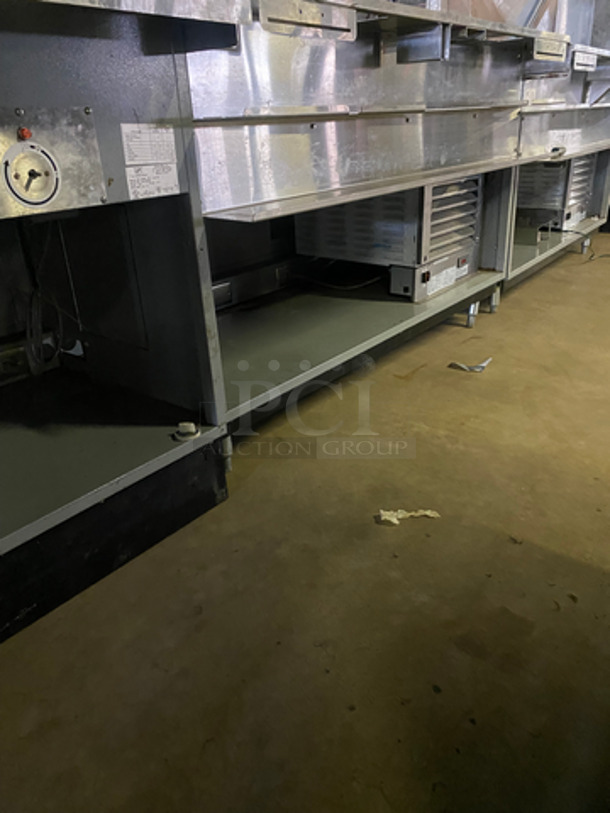 AMAZING! Duke Stainless Steel Commercial Subway Prep Line w/ Lowering Sneeze Guards. (1) Hot Well, (2) Refrigerated Prep Tables, (1) Point of Sale Station, 4 In Counter Cup Dispensers, (4) Chip Merchandisers, Credit Card Machine Mount and Rear Lower Dry Storage. Separates Into 4 Pieces! Model: SWD70060FLM SN: 10100312 120V 60HZ 1 Phase, Model: SWH70025FLM SN: 09103602 120V 60HZ 1 Phase, Model: SUBCPTC60M SN: 10100174 120V 60HZ 1 Phase - Image 10 of 12