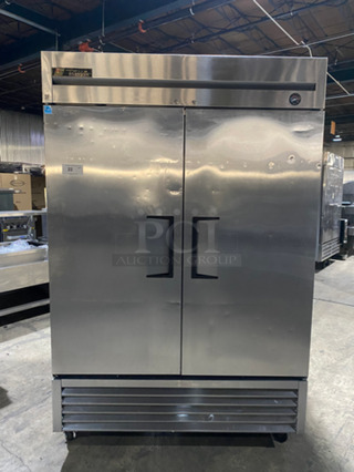 COOL! True Commercial 2 Door Reach In Freezer! With Poly Coated Racks! All Stainless Steel! On Casters! Model: T49F SN: 7701330 115V 60HZ 1 Phase