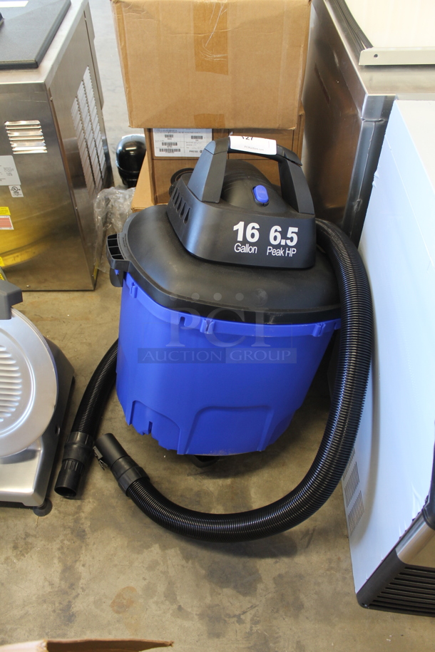 BRAND NEW SCRATCH AND DENT! Lavex 457PRO16GAL Blue and Black Poly Wet Dry Vac Vacuum Cleaner. 120 Volts, 1 Phase. Tested and Working! - Image 1 of 5