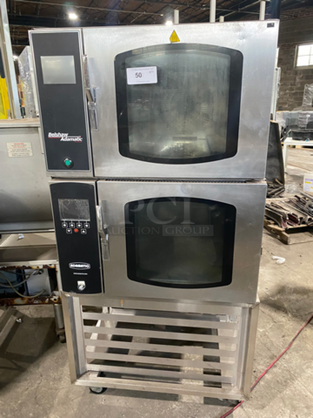 SUPER! Belshaw Adamatic Commercial Electric Powered Doble Deck Combi Oven! With View Through Doors! With Pan Racks Underneath! All Stainless Steel! On Casters! 2x Your Bid Makes One Unit! Model: FG189UZ84 SN: 2000003710FA032620 208/220V 60HZ 3 Phase