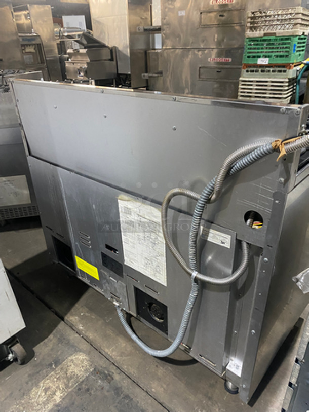 AMAZING! Viking Duel Fuel Powered 4 Burner Stove! With Built In Flat And Ribbed Griddle! With 2 Oven Underneath! Metal Oven Racks! All Stainless Steel! On Legs! - Image 4 of 12