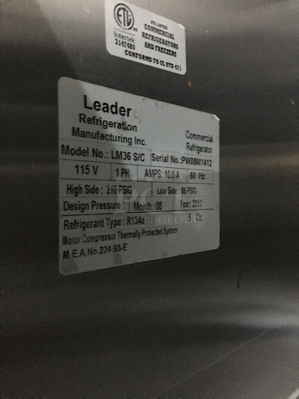 Leader Commercial Refrigerated Sandwich Prep Table! With 2 Door Underneath Storage Space! With Poly Coated Racks! With Commercial Cutting Board! All Stainless Steel! On Casters! Model: LM36 SN: PW08M1412 115V 60Hz 1 Phase - Image 7 of 10