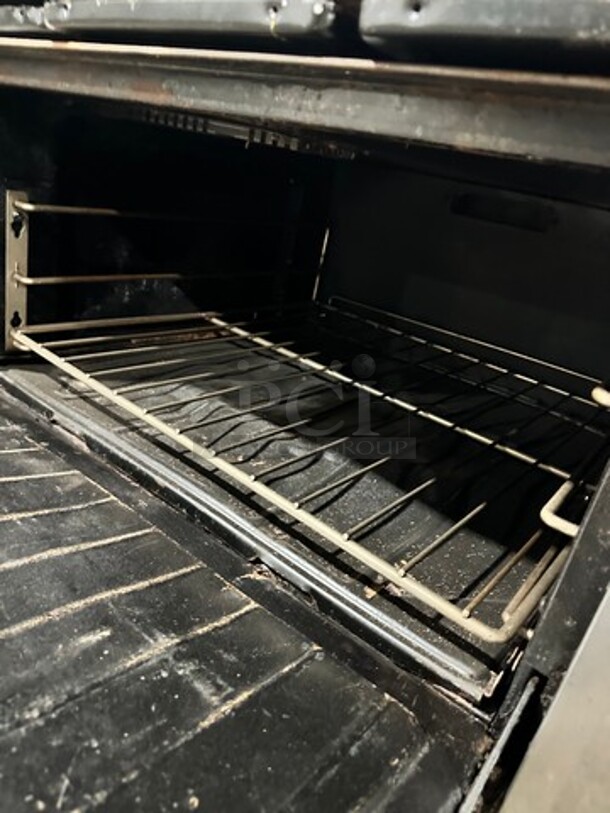 Garland Commercial Natural Gas Powered 6 Burner Stove! With Raised Back Splash! With Oven Underneath! Metal Oven Rack! All Stainless Steel! On Casters! - Image 7 of 10