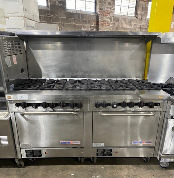 Southbend Commercial Natural Gas Powered 12 Burner Stove! With Raised Back Splash And Salamander Shelf! With 2 Full Size Oven Underneath! All Stainless Steel! On Casters! Working When Removed!