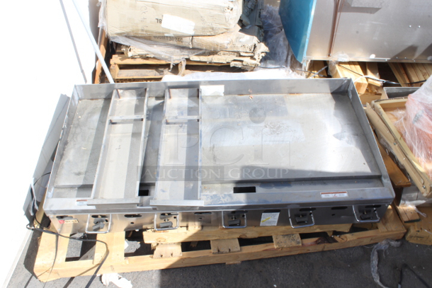 BRAND NEW SCRATCH & DENT! Wolf by Vulcan AGM60-NAT Natural Gas 60" Heavy-Duty Gas Countertop Griddle with Manual Controls - 135,000 BTU. Missing legs and minor denting.  - Image 2 of 5
