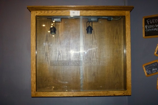 Wall Mounted Wood Display Case, Sliding Glass Doors And (2) Light Fixtures. 