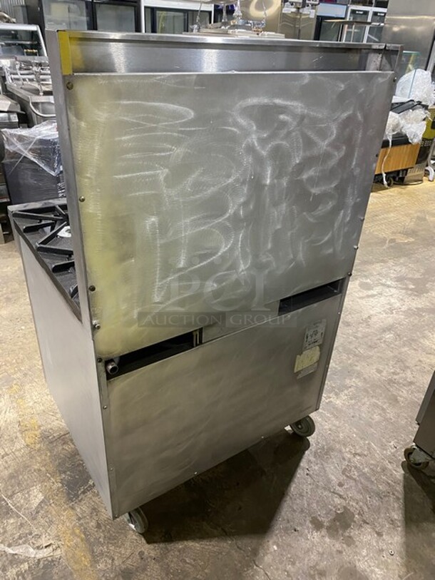 SouthBend Commercial Natural Gas Powered Split Top 4 Burner Stove! With Left Side Flat Griddle! With Full Sized Oven Underneath! With Backsplash! All Stainless Steel! With Metal Oven Racks! On Casters! Model: X336D-1GL SN: 04C65469! - Image 4 of 12