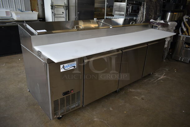 BRAND NEW SCRATCH AND DENT! 2023 Avantco 178SSPPT3 Stainless Steel Commercial Refrigerated Pizza Prep Table on Commercial Casters. 115 Volts, 1 Phase. Tested and Working! - Image 3 of 12