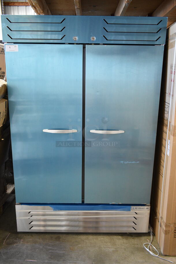 BRAND NEW SCRATCH AND DENT! Beverage Air SF2HC-1S Stainless Steel Commercial 2 Door Reach In Freezer w/ Poly Coated Racks and Commercial Casters. 120 Volts, 1 Phase. Tested and Working! - Image 2 of 9