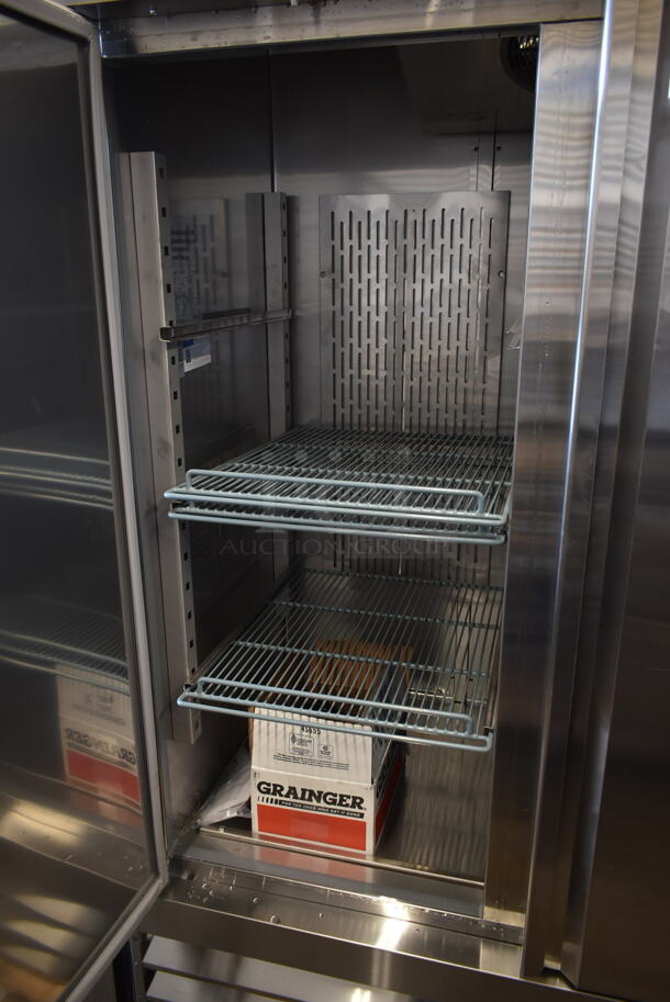 BRAND NEW SCRATCH AND DENT! 2023 Avantco 178SS3FHC Stainless Steel Commercial 3 Door Reach In Freezer w/ Poly Coated Racks and Commercial Casters. 115 Volts, 1 Phase. Stock Picture Used as Gallery. Tested and Working! - Image 6 of 12