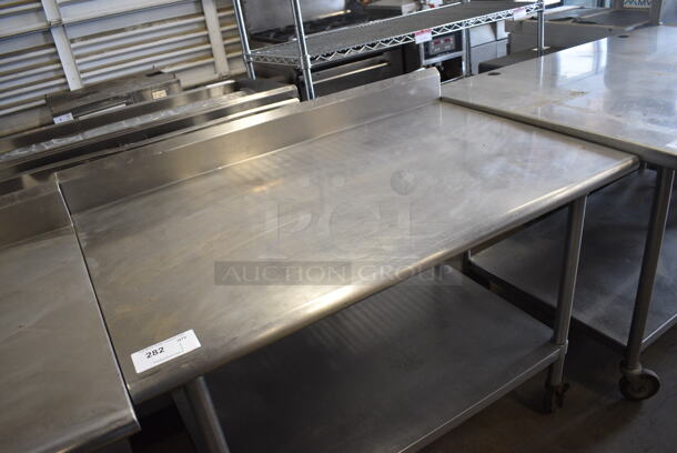 Stainless Steel Commercial Table w/ Under Shelf and Back Splash on Commercial Casters. 48x30x40 - Image 3 of 4