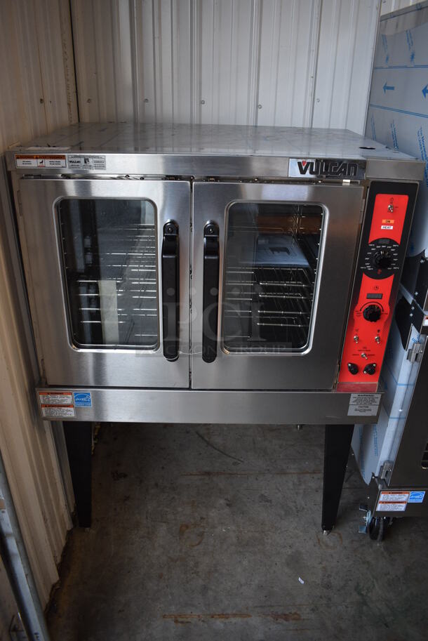 BRAND NEW SCRATCH AND DENT! LATE MODEL! Vulcan Model VC5ED Stainless Steel Commercial Electric Powered Full Size Convection Oven w/ View Through Doors, Metal Oven Racks and Thermostatic Controls on Metal Legs. 208 Volts, 3/1 Phase. 40x31x54. Tested and Working!