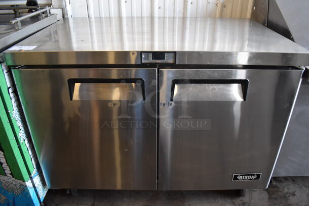2015 Bison MGF8406 Stainless Steel Commercial 2 Door Undercounter Freezer on Commercial Casters. 115 Volts, 1 Phase. 48x30x37.5. Tested and Working!