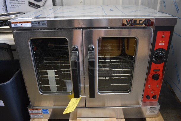 BRAND NEW SCRATCH AND DENT! Vulcan Model VC5ED Stainless Steel Commercial Electric Powered Full Size Convection Oven w/ View Through Doors, Metal Oven Racks and Thermostatic Controls. 208 Volts, 3/1 Phase. 40x31x30.5