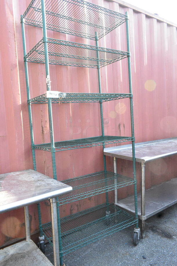 Green Finish 6 Tier Wire Shelving Unit on Commercial Casters. BUYER MUST DISMANTLE. PCI CANNOT DISMANTLE FOR SHIPPING. PLEASE CONSIDER FREIGHT CHARGES.  - Image 1 of 4