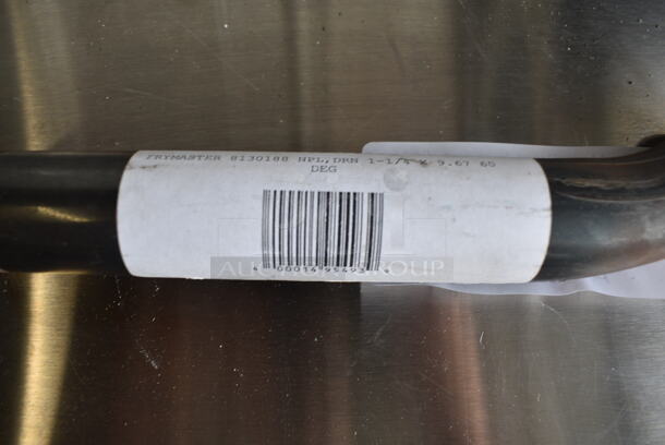 BRAND NEW SCRATCH AND DENT! Lot of Various Items Including Vollrath 47709 Steak Weight, Frymaster 8130188 Npl,Drn 1-1/4 X 9.67 60 Deg, CX17M2 Grill Brush, Round Metal Pizza Pan, Metal Fry Basket.  - Image 8 of 10