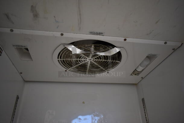 2013 True TG1R-1S ENERGY STAR Stainless Steel Commercial Single Door Reach In Cooler w/ Poly Coated Racks on Commercial Casters. 115 Volts, 1 Phase. Tested and Working! - Image 5 of 7