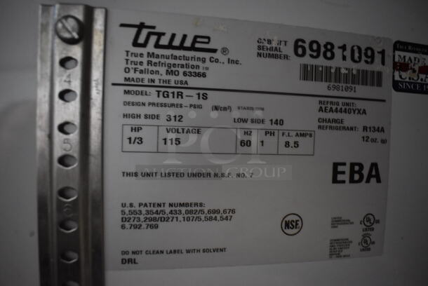 2011 True TG1R-1S Stainless Steel Commercial Single Door Reach In Cooler w/ Poly Coated Racks on Commercial Casters. 115 Volts, 1 Phase. 29x35x83. Tested and Working! - Image 4 of 5