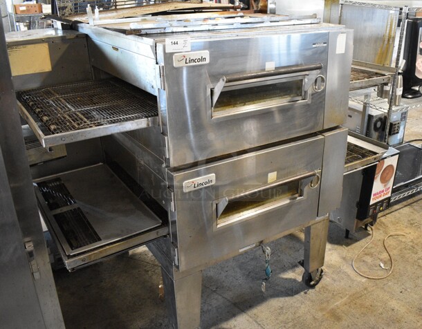 2 2014 Lincoln Impinger Model 1600-000-U-K1968 Stainless Steel Commercial Natural Gas Powered Conveyor Pizza Ovens on Commercial Casters. 110,000 BTU. 84x60x66. 2 Times Your Bid!