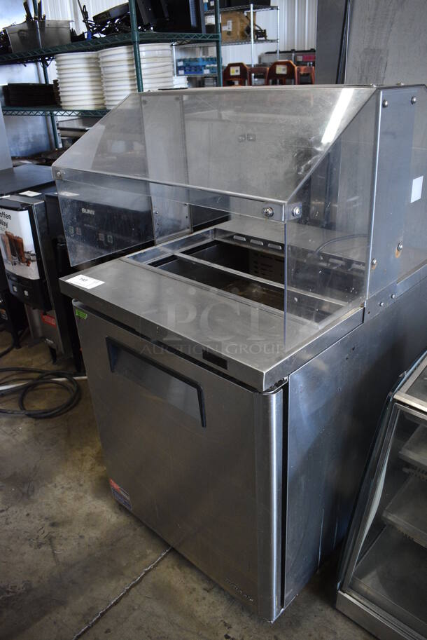 Turbo Air Model MUF-28-N-711S Stainless Steel Commercial Single Door Work Top Freezer w/ Sneeze Guard. 115 Volts, 1 Phase. 27.5x30x50. Tested and Powers On But Temps at 53 Degrees