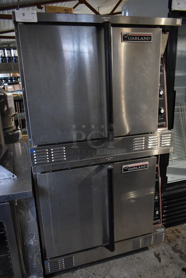 2 Garland Master 200 Stainless Steel Commercial Natural Gas Powered Full Size Convection Ovens w/ Solid Doors, Metal Oven Racks and Thermostatic Controls. 2 Times Your Bid!