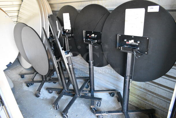 8 Folding Round Table on Casters. 8 Times Your Bid!  - Image 1 of 3