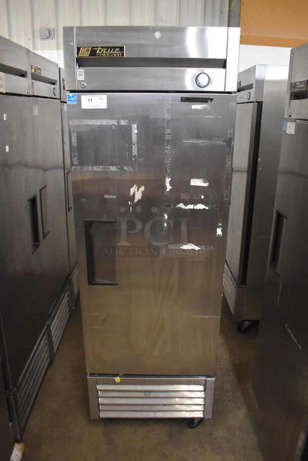 2013 True T-23F ENERGY STAR Stainless Steel Commercial Single Door Reach In Freezer w/ Poly Coated Racks on Commercial Casters. 115 Volts, 1 Phase. 27x30x83.5. Tested and Working! - Image 1 of 6