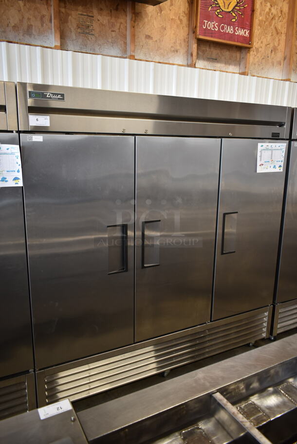 2017 True T-72F-HC Stainless Steel Commercial 3 Door Reach In Freezer w/ Poly Coated Racks on Commercial Casters. 115 Volts, 1 Phase. Tested and Working! - Image 1 of 9