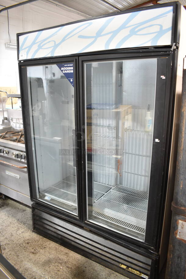 True GDM-49F Metal Commercial 2 Door Reach In Freezer Merchandiser w/ Poly Coated Racks. 115/208-230 Volts, 1 Phase.  - Image 1 of 6