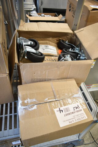 3 BRAND NEW SCRATCH AND DENT! Items Including 460BLKMOBSET Regency 5" Black Polyurethane Swivel Shelving Stem Casters - 4/Pack, 190RA40CSTR 4" High-Temp Swivel Plate Caster with Built-In Zerk Grease Fitting. 3 Times Your Bid! 