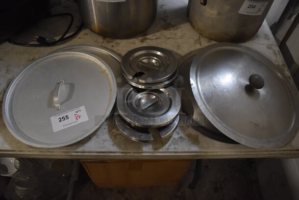 8 Various Round Metal Lids. Includes 14x14x2, 15.5x15.5x2, 8x8x4. 8 Times Your Bid!