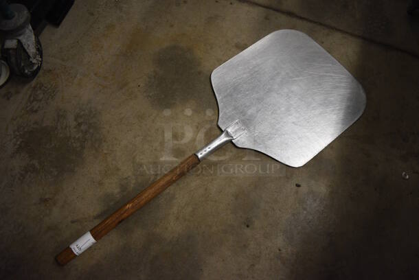 Metal Pizza Peel w/ Wooden Handle. 14x35 - Image 1 of 2